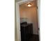 A conveniently located laundry room featuring a modern washer and dryer at 117 Logan Pond Way, North Las Vegas, NV 89084