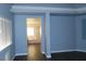Bright main bedroom with hardwood floors and window at 117 Logan Pond Way, North Las Vegas, NV 89084