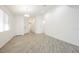Bright and airy living room featuring modern floors and neutral decor at 12426 Mosticone Way, Las Vegas, NV 89141