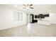 Bright, open-concept living room with sleek floors and access to the backyard at 12426 Mosticone Way, Las Vegas, NV 89141