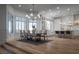 Open concept dining room and kitchen with gorgeous wood floors at 1610 Brock Ct, Las Vegas, NV 89117