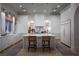 Gourmet kitchen featuring a large marble island, custom cabinetry, and stainless steel appliances at 1610 Brock Ct, Las Vegas, NV 89117