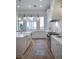 Gourmet kitchen with marble countertops, white cabinetry, and modern appliances at 1610 Brock Ct, Las Vegas, NV 89117