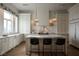 Bright kitchen with a large island, marble countertops, and stainless steel appliances at 1610 Brock Ct, Las Vegas, NV 89117