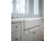 Bright kitchen with a white farmhouse sink and marble countertops at 1610 Brock Ct, Las Vegas, NV 89117