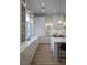Bright kitchen features marble countertops, white cabinetry and stainless steel appliances at 1610 Brock Ct, Las Vegas, NV 89117