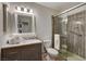 Updated bathroom features a sleek glass enclosed shower at 1721 Sweet Pea Ave, Las Vegas, NV 89183