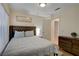 Bedroom features a large window, and cozy decor at 1721 Sweet Pea Ave, Las Vegas, NV 89183