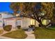 Charming single-Gathering home showcasing mature landscaping and a beautiful, shaded front yard at 1721 Sweet Pea Ave, Las Vegas, NV 89183