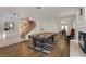Open-concept game room with a pool table, staircase, and view into the dining area at 1721 Sweet Pea Ave, Las Vegas, NV 89183