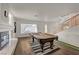 Inviting game room with a pool table, fireplace, and staircase leading to the upper level at 1721 Sweet Pea Ave, Las Vegas, NV 89183