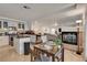 Open-concept living space with dining and kitchen area at 1721 Sweet Pea Ave, Las Vegas, NV 89183