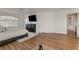 Spacious main bedroom boasting hardwood floors and an entertainment center at 1721 Sweet Pea Ave, Las Vegas, NV 89183