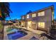 A spacious backyard with a large swimming pool, spa, covered patio, and mature trees at 1721 Sweet Pea Ave, Las Vegas, NV 89183