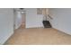 Spacious basement featuring neutral tile flooring, painted walls, and staircase to the main floor at 1806 Renada Cir, North Las Vegas, NV 89030