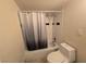 Standard bathroom featuring a shower-tub combo and updated fixtures at 1806 Renada Cir, North Las Vegas, NV 89030