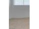 A bright bedroom featuring neutral tile flooring at 1806 Renada Cir, North Las Vegas, NV 89030