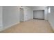 Bedroom featuring neutral walls and tile floors, with an open closet space at 1806 Renada Cir, North Las Vegas, NV 89030