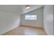 Bedroom with a window offering neighborhood views and tile floors at 1806 Renada Cir, North Las Vegas, NV 89030
