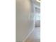 Bright blank wall with minimal baseboards, tile floors and a window at 1806 Renada Cir, North Las Vegas, NV 89030