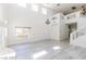 Spacious living room featuring double-door entry and light gray vinyl floors at 1904 Imola Ct, Las Vegas, NV 89123