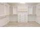 Well-organized walk-in closet features shelving, drawers, and hanging rods for ample storage at 1904 Imola Ct, Las Vegas, NV 89123