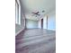 Bright bedroom with updated flooring, ceiling fan, and natural light at 1967 N Moapa Valley Blvd, Logandale, NV 89021
