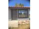 Front exterior view with a door and a window at 1967 N Moapa Valley Blvd, Logandale, NV 89021