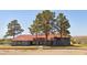 Expansive single story home with a red-tiled roof and desert landscaping at 1967 N Moapa Valley Blvd, Logandale, NV 89021