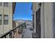 Intimate balcony with a view of distant mountains and parking, enhancing urban living at 2080 Karen Ave # 12, Las Vegas, NV 89169