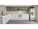 Modern kitchen with stainless steel appliances, sleek cabinetry, and quartz countertops at 2080 Karen Ave # 12, Las Vegas, NV 89169