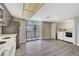 Bright kitchen featuring a stainless steel refrigerator, access to a balcony and the laundry area at 2080 Karen Ave # 12, Las Vegas, NV 89169