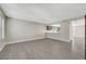 Bright living room featuring updated floors, neutral paint and open concept design at 2080 Karen Ave # 12, Las Vegas, NV 89169