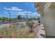 Charming view of local street with flowers in foreground, providing a pleasant streetscape at 2080 Karen Ave # 12, Las Vegas, NV 89169