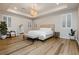 Serene main bedroom with tray ceilings, plantation shutters, and stylish furniture, creating a relaxing retreat at 2450 Amatrice St, Henderson, NV 89044