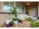 Charming patio with seating, stylish planters, and a cozy ambiance at 2450 Amatrice St, Henderson, NV 89044