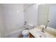 Standard bathroom with tub and shower combo, sink, and toilet at 2755 Jennydiane Dr, Las Vegas, NV 89121