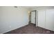 This carpeted bedroom has neutral walls and features a closet at 2755 Jennydiane Dr, Las Vegas, NV 89121