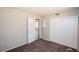 Bedroom features include neutral walls, carpeting and a sliding closet door at 2755 Jennydiane Dr, Las Vegas, NV 89121