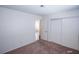 The bedroom features neutral walls, carpeting and a closet at 2755 Jennydiane Dr, Las Vegas, NV 89121