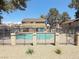 Community pool area featuring a secure iron fence, promising a relaxing outdoor experience for residents at 2755 Jennydiane Dr, Las Vegas, NV 89121