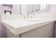 Bathroom vanity with a modern, undermount sink, sleek faucet, and a clean, white countertop at 2807 Hermosa St, Las Vegas, NV 89169