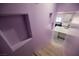 Interior staircase with a view of kitchen, offering easy access to the upper floors at 2807 Hermosa St, Las Vegas, NV 89169