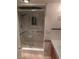 Bathroom featuring tiled shower with glass door and vanity, blending comfort and design at 3111 Bel Air Dr # 6E, Las Vegas, NV 89109