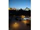 Evening view of the Las Vegas skyline and pool area at 3111 Bel Air Dr # 6E, Las Vegas, NV 89109