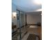 View of the condo entryway featuring mirror sliding door closet and neutral tile flooring at 3111 Bel Air Dr # 6E, Las Vegas, NV 89109