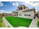 Expansive backyard with lush landscaping and a well-maintained lawn at 350 Gandara St, Las Vegas, NV 89138
