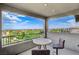 Enjoy outdoor dining on this inviting balcony with comfortable seating and picturesque community views for relaxing and unwinding at 350 Gandara St, Las Vegas, NV 89138