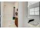 Bathroom featuring a bathtub, modern vanity, and white tile at 350 Gandara St, Las Vegas, NV 89138
