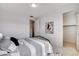 Comfortable bedroom featuring a walk in closet, easy access to the ensuite bath, and neutral decor at 350 Gandara St, Las Vegas, NV 89138
